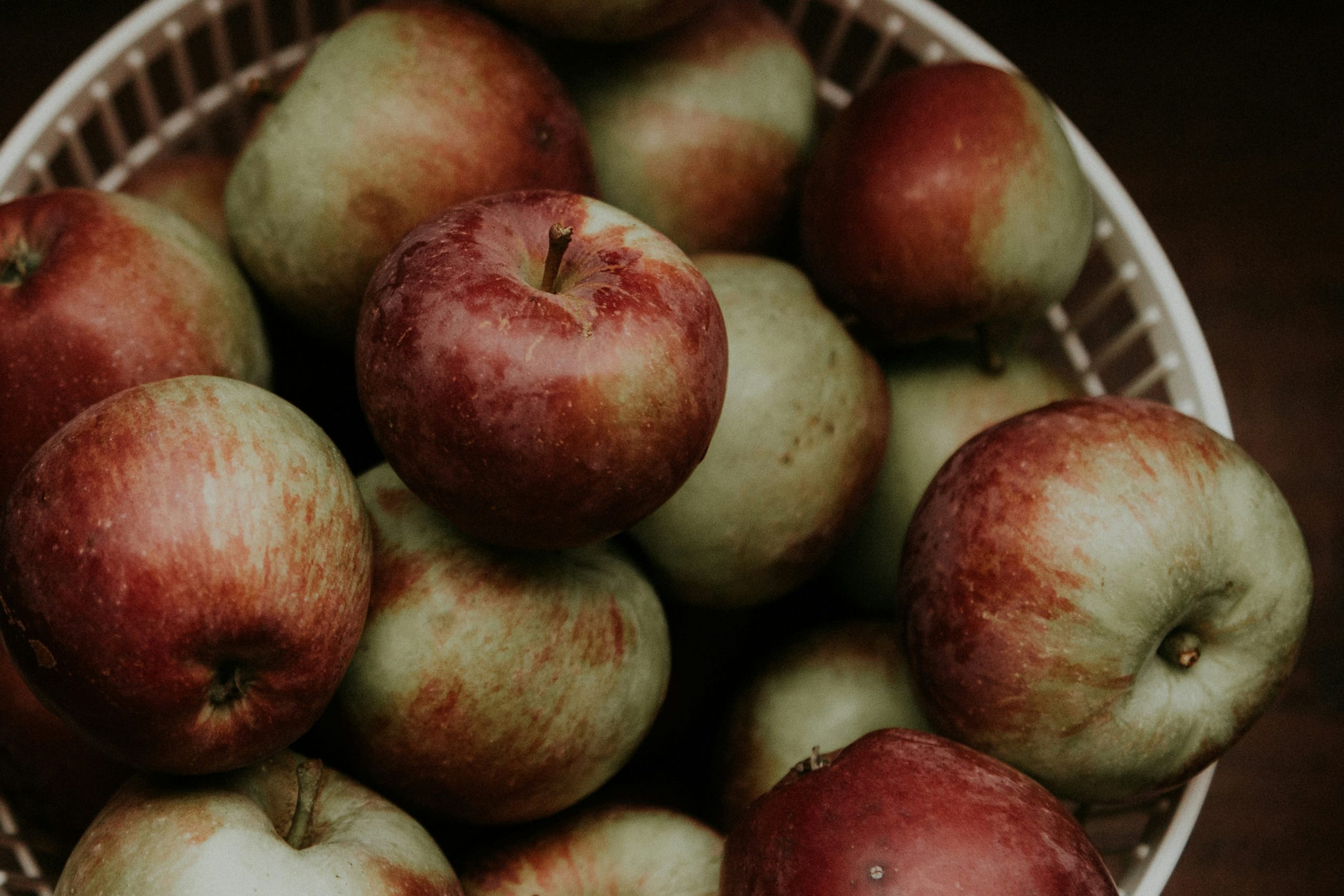 Close-up of red apples in a basket.